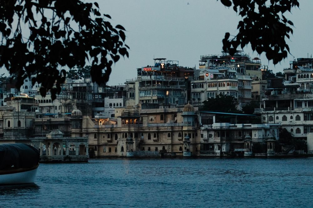The City Palace from Lake Pichola at dusk, Udaipur