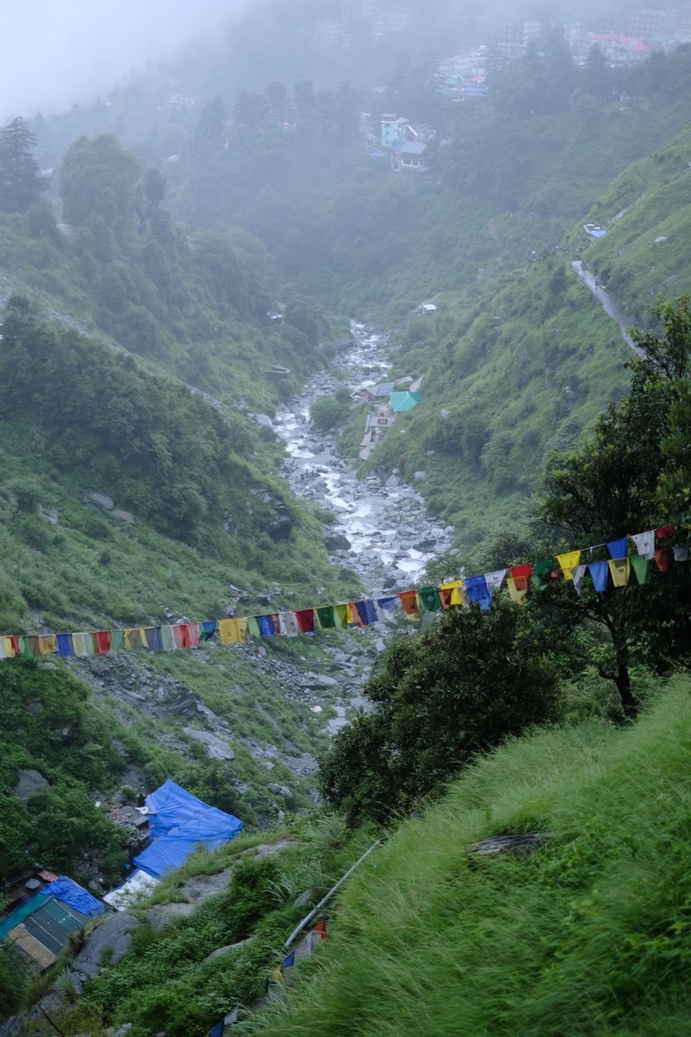 Prayer flags over a mountain valley