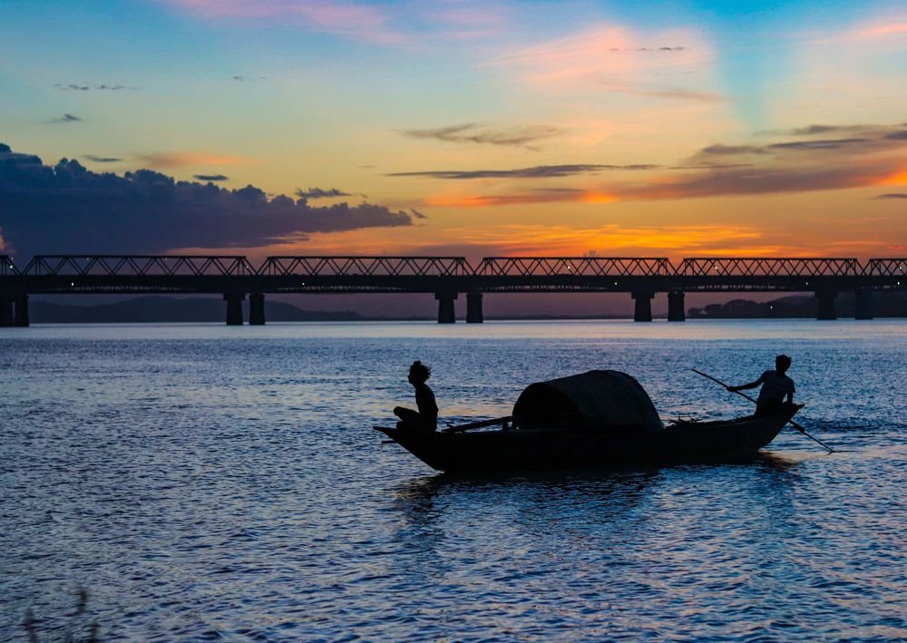 Fishermen on the Brahmaputra at sunset, Guwahati