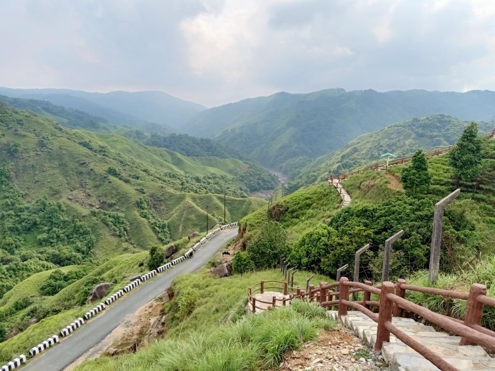 Green valleys and a winding road in the Khasi Hills
