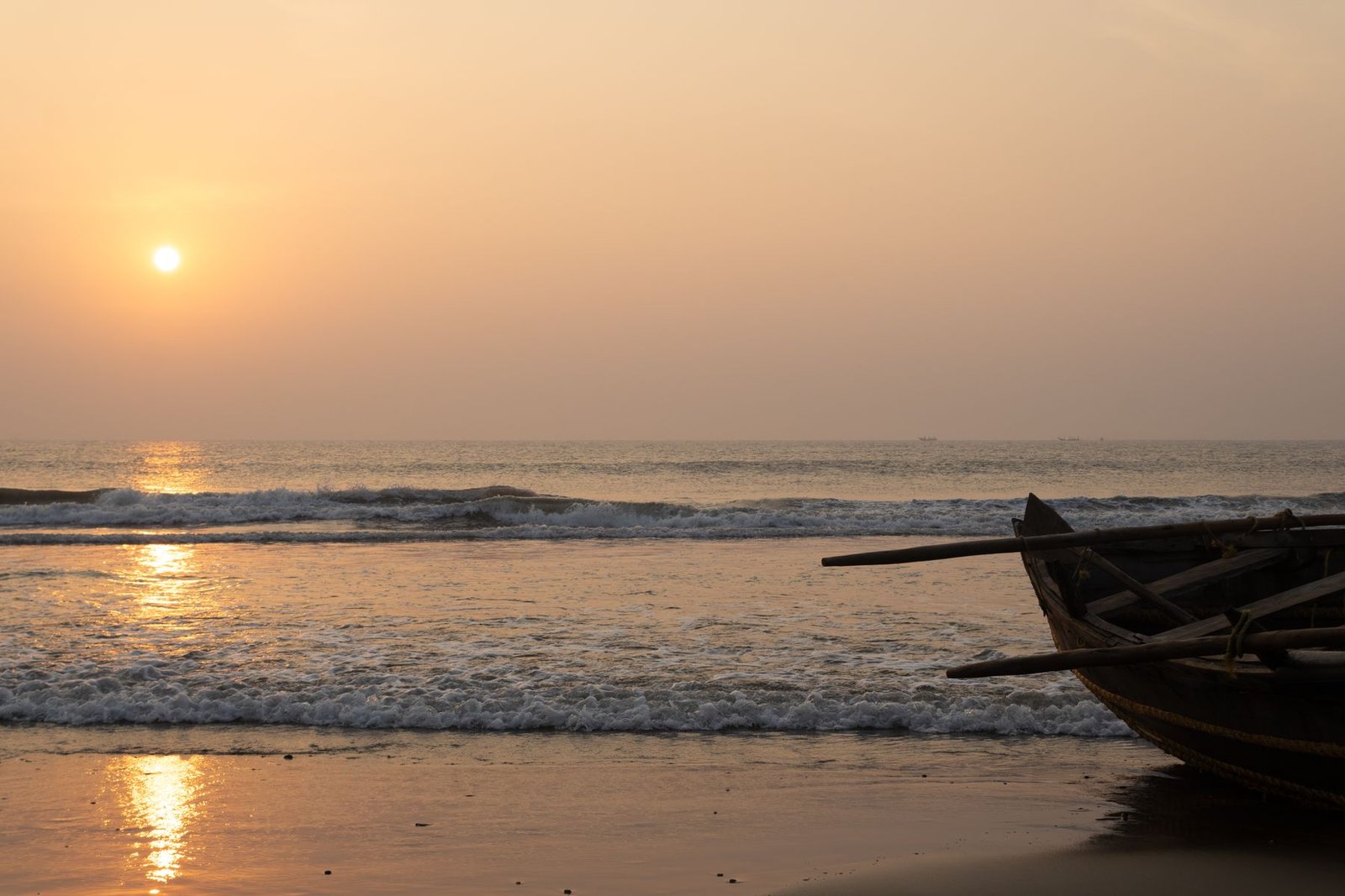 Sunrise and fishing boats on the coast