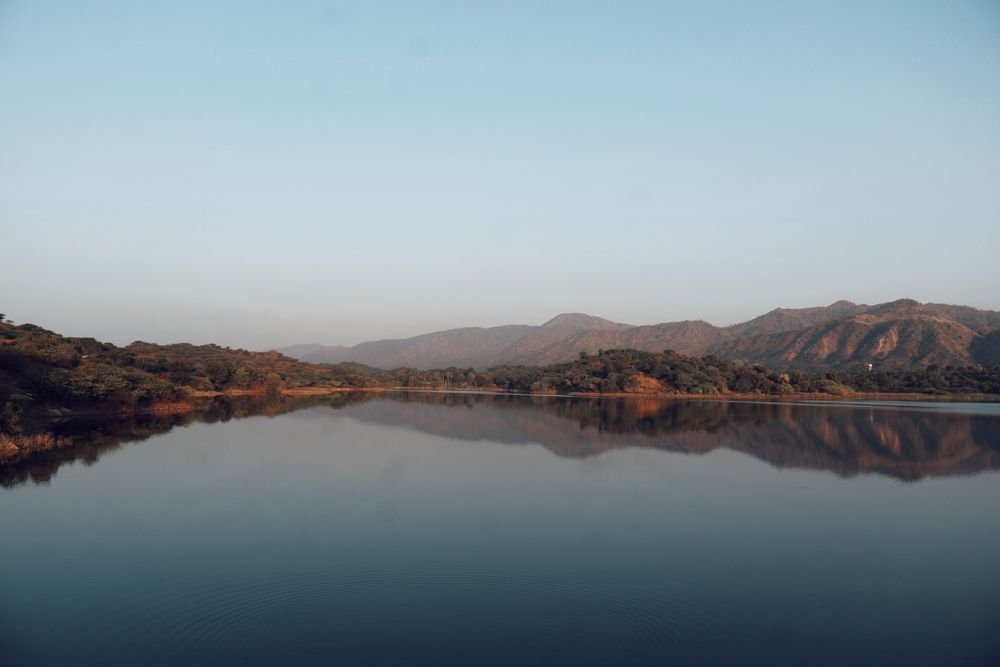 Hills reflected in a lake at Mount Abu
