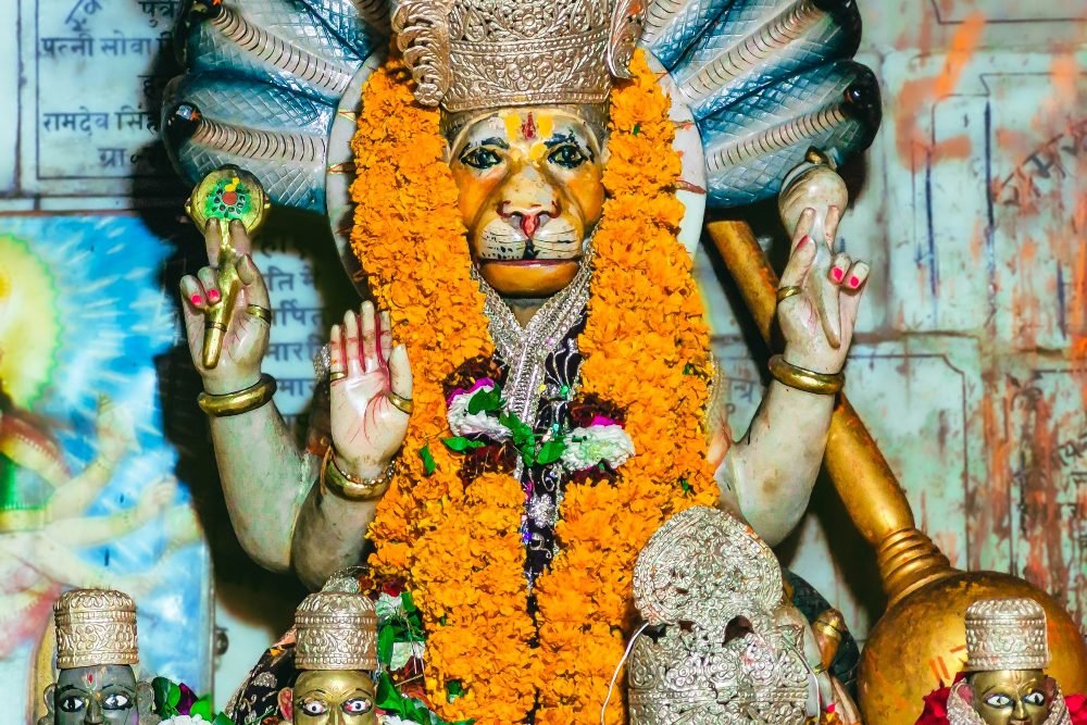 A garlanded Hanuman in an Ayodhya temple