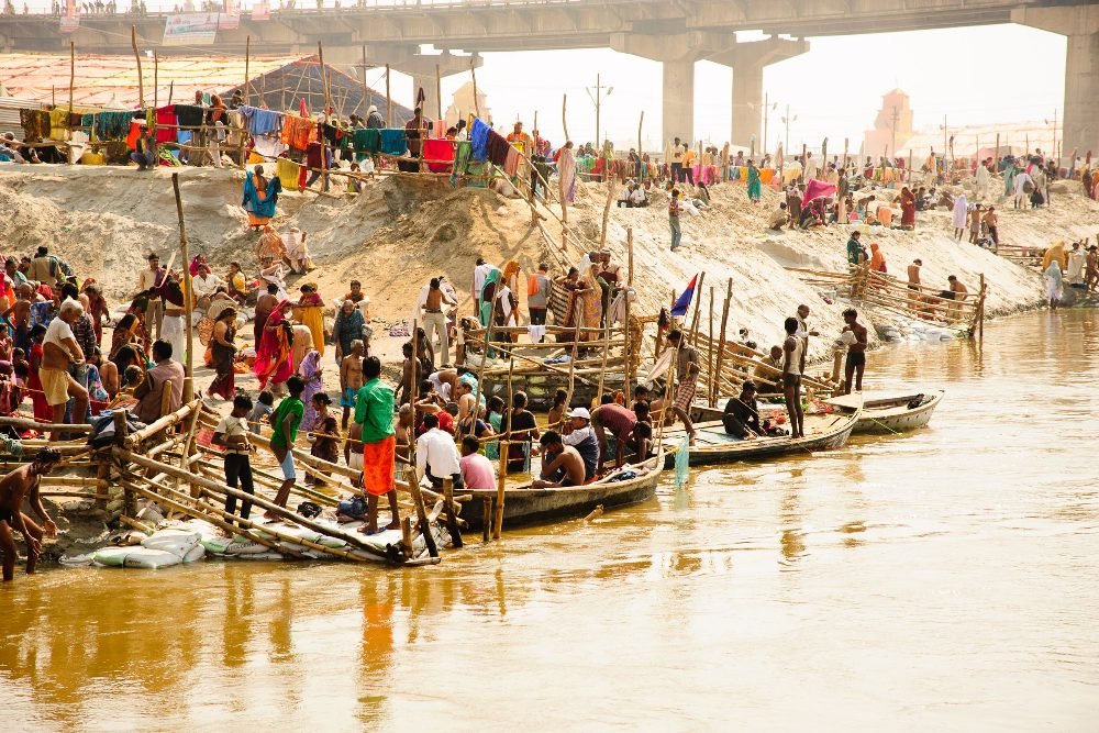 Pilgrims and boats on the river at Prayagraj